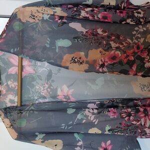 Kimono. Light grey background with flowers. Size small. See through